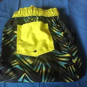 Extreme Coalition boys youth size swim trunks.
